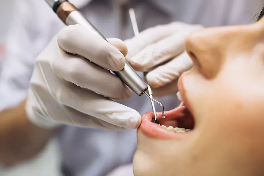 جراح دندانپزشک دکتر فاطمه ملک الکتاب